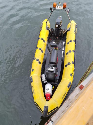 Looking down on a yellow speedboat